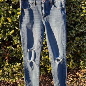 High waisted slim fit distressed blue denim